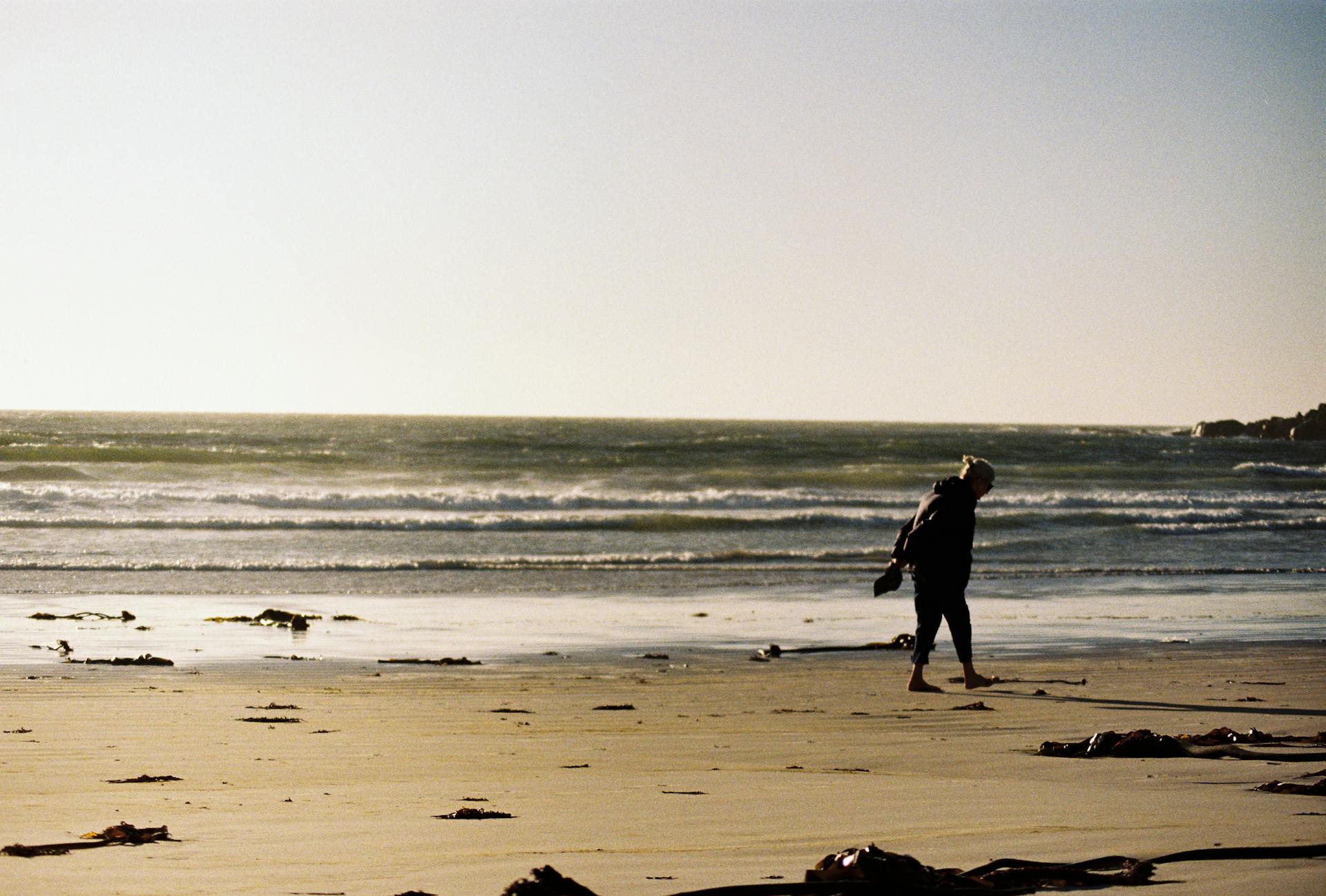 lady walking on a beach